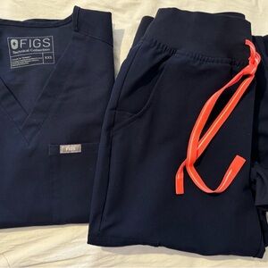 Figs Navy Scrub Set in Dark Blue with Bright Orange Accent